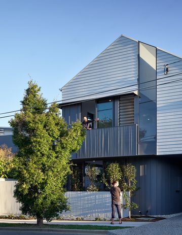 With gabled roofs and weatherboard cladding, the houses reference the Queenslander without being overly deferential.