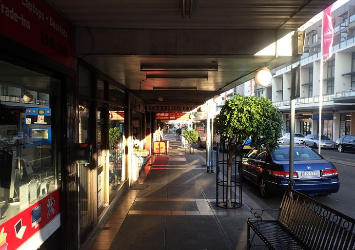 One of many Sydney streets where awnings protect pedestrians from the sun.