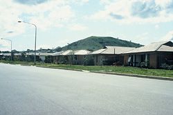 The advance by the 1970s seems to be different roof and wall colours (veneered, not full brick). The banal plans remain, along with small windows and the insistence on facing the street. No verandahs or shading other than eaves. Image: Tone Wheeler