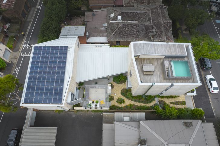 The house includes on-site storm water harvesting and solar energy generation.