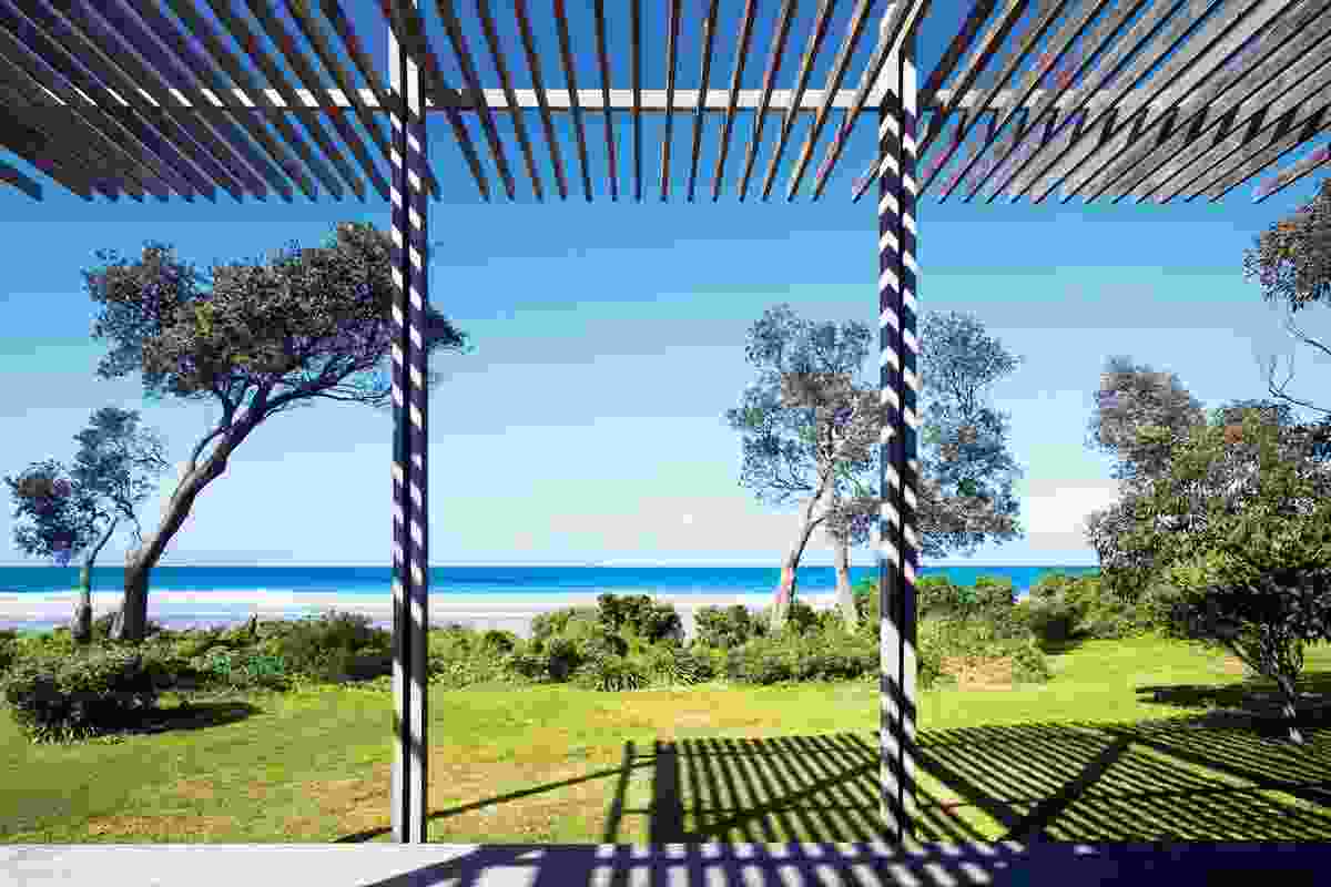 The pergola is built to the height of neighbouring banksia trees.