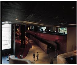 Overview of the main display area, with its two leather curving walls. The processes of transforming the artworks into part of the built fabric of the Rue de l’Universite building. Image: Philippe Ruault