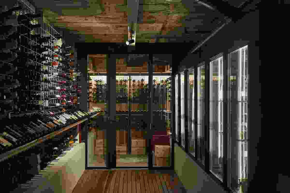 Care­ful­ly chore­o­graphed light­ing casts the cellar as a spe­cial place to seek out fine wine.
