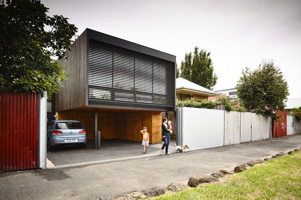 The extension raises living spaces from the existing house to capture views to the adjacent reserve and Melbourne city.