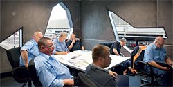 The utilitarian spaces within are conventionally partitioned and
can be reconfigured
as required.